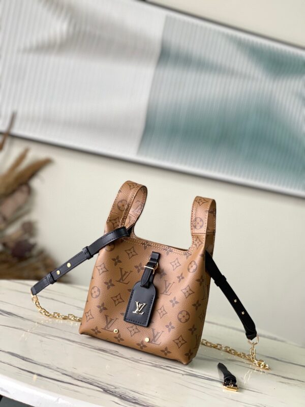 Top original order M46816 This Atlantis BB handbag is made of Monogram Reverse canvas